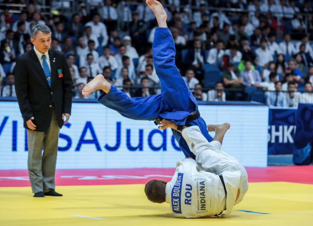 Alex Bologa of Romania executes a stunning throw